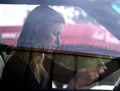 Nicky Hilton texting in her GMC Yukon