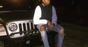 Swaggy P Sitting on his Jeep