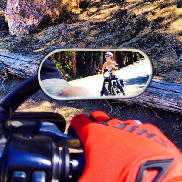 pink riding her motorcycle